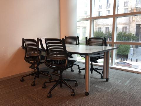 Study Room B with small rectangular table and four chairs