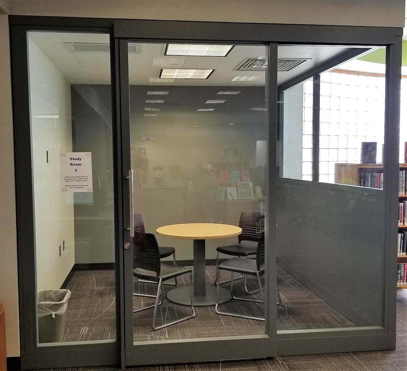 Study Room at The Village Library with circular table and four chairs