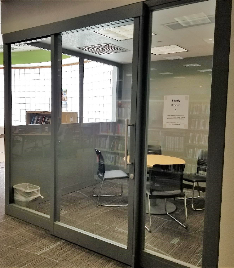 Study Room at The Village Library with circular table and four chairs