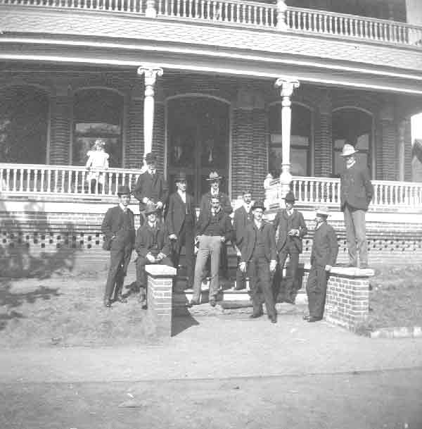 Men outside of the Alamo Hotel