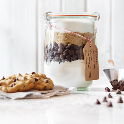 pretty jar full of cookie ingredients in layers