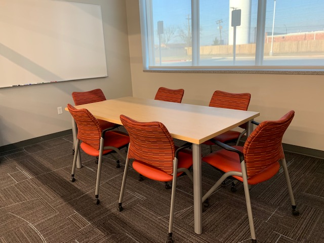 Study room at Del City with a table and 6 chairs