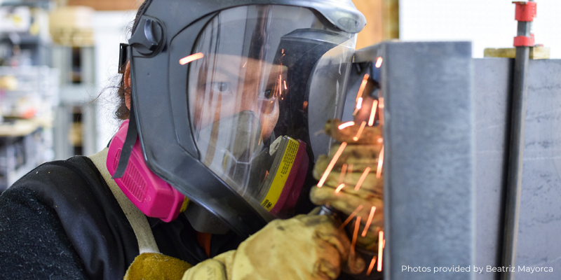 "Oklahoma City artist Beatriz Mayorca welding an art installation"