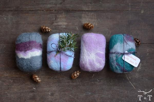 four beautiful felted soap bars in teal and purple