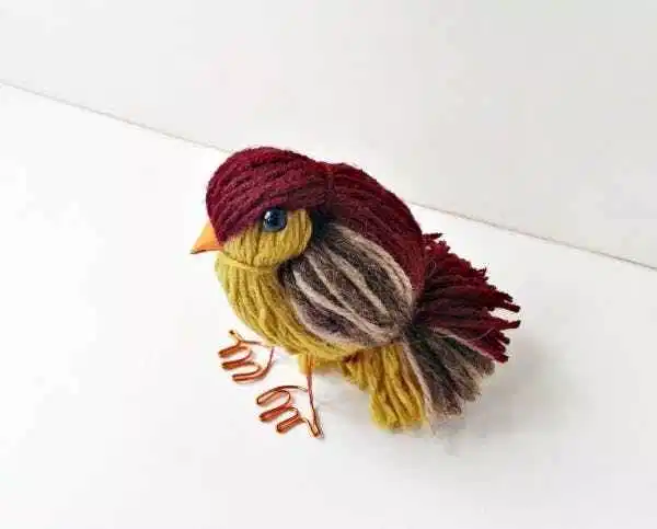 small bird made of yarn