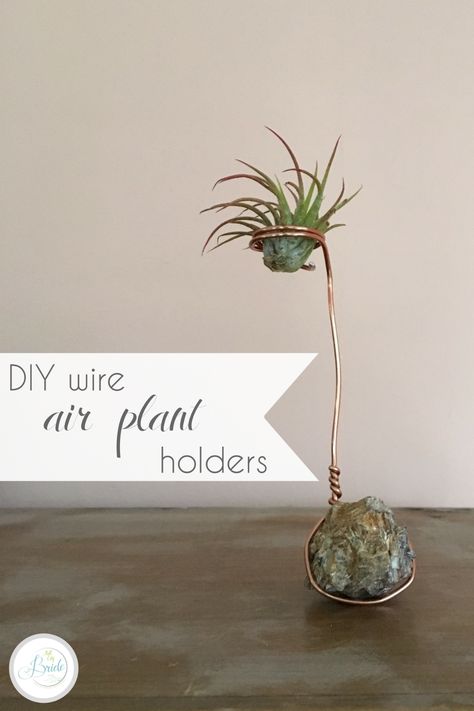 copper wire air plant holder with a rough crystal base