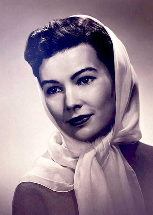 Photographic portrait of an unknown woman with dark hair.