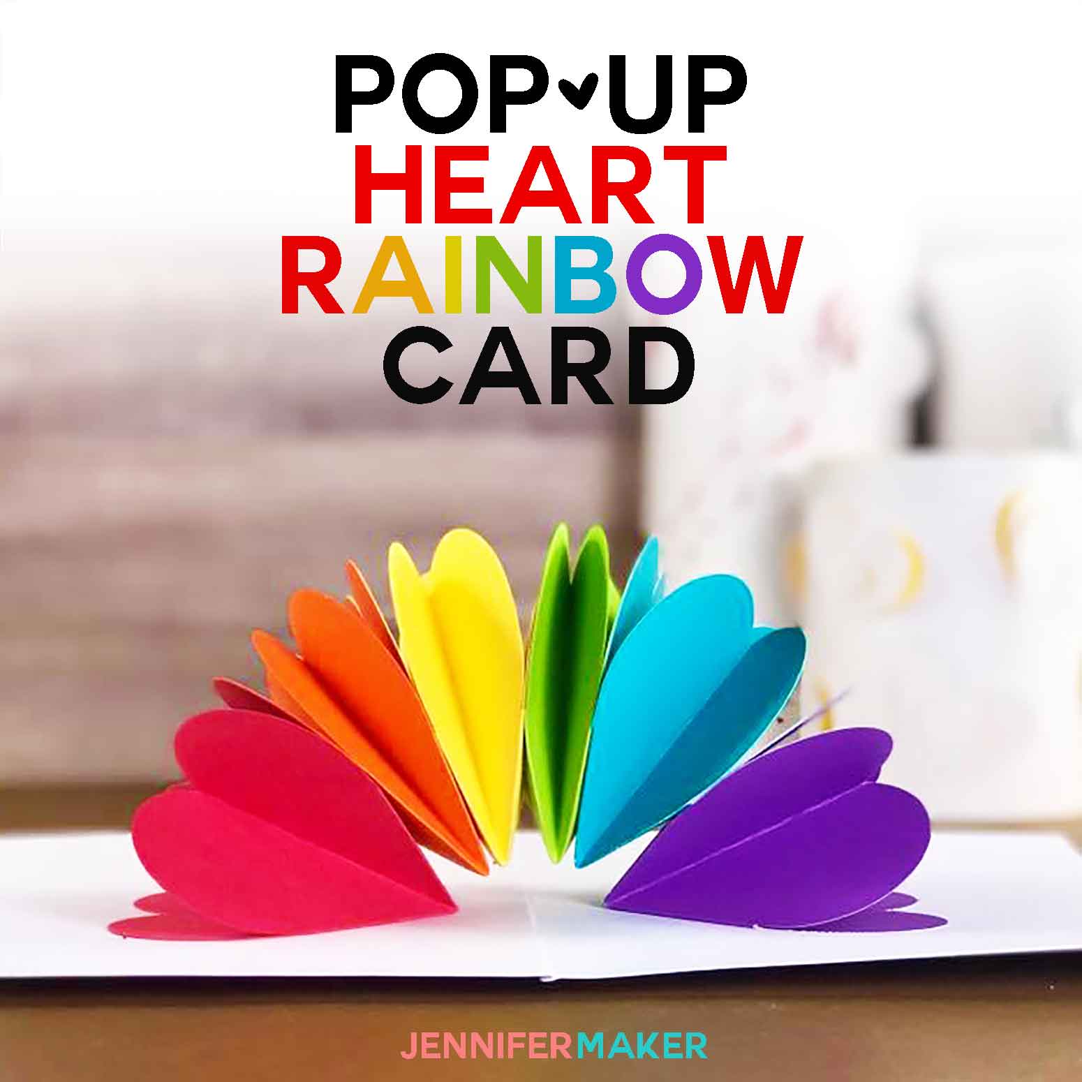 white card with pop-up rainbow hearts