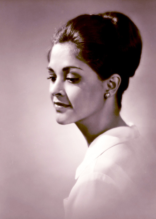 Photographic portrait of an unknown woman with dark hair.