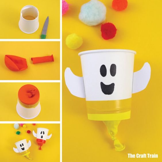 white cup ghost with balloon to create a popper