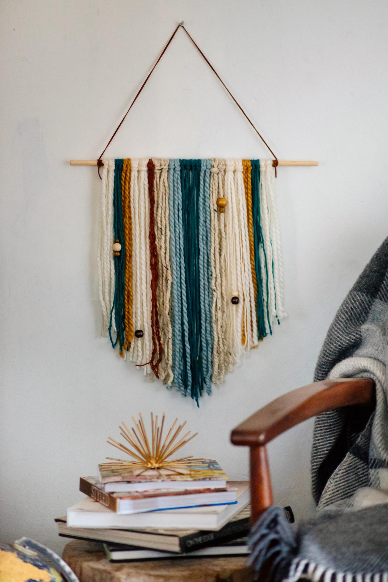a yarn hanging display on a wall