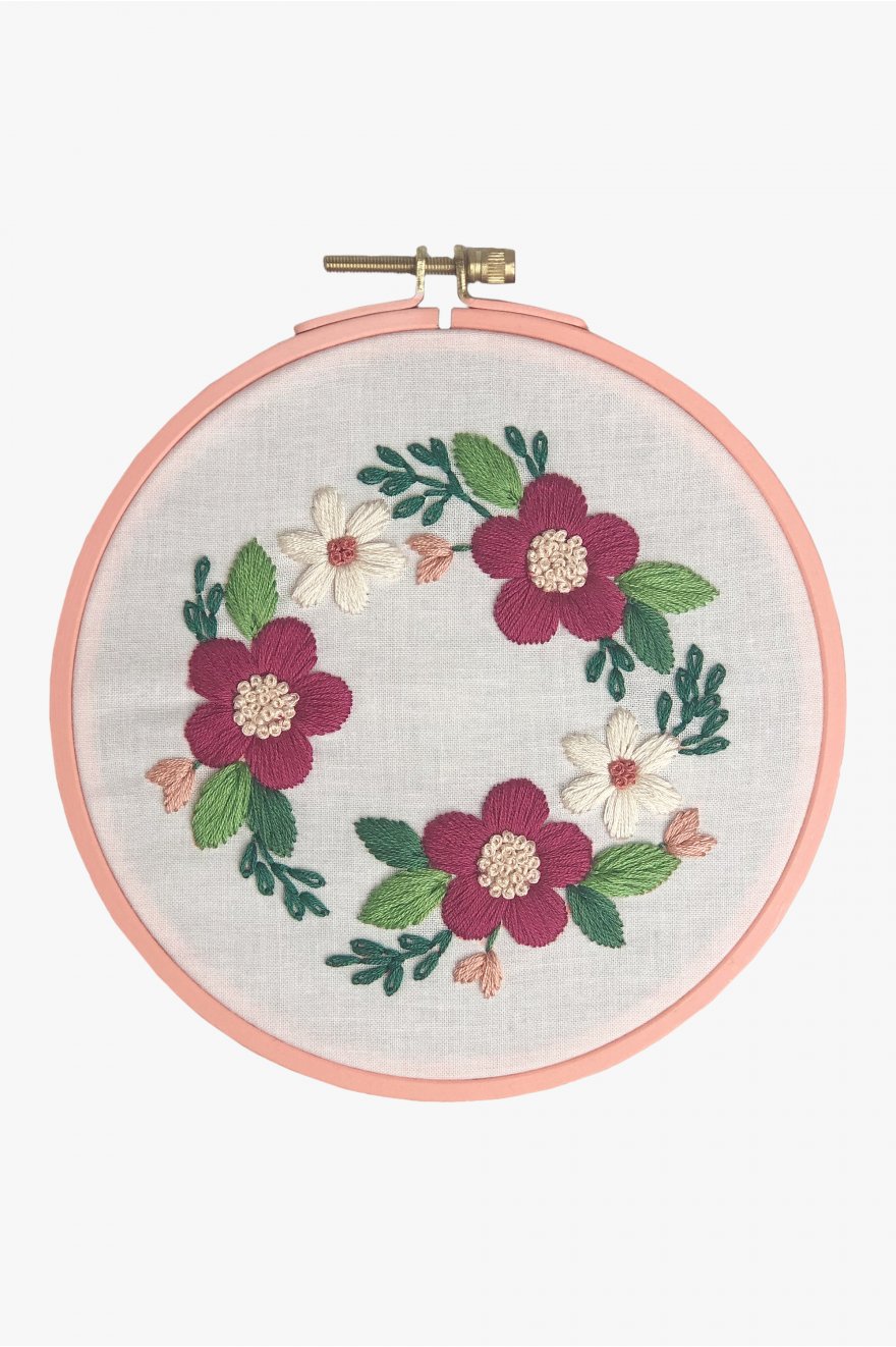 a pink and green simple floral embroidery wreath