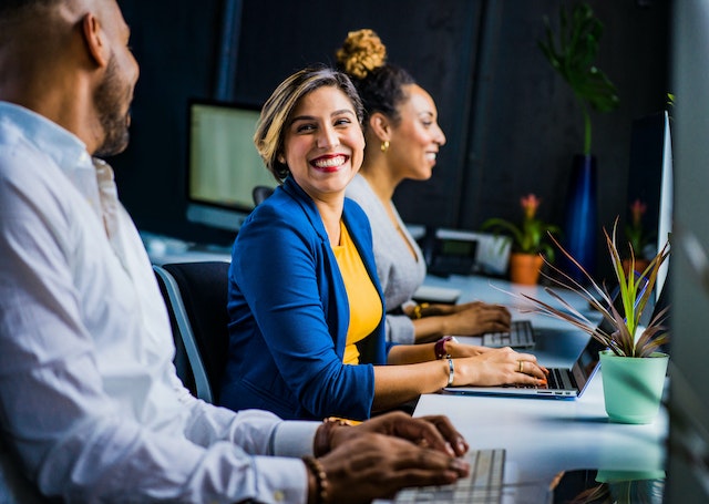 Photo by Jopwell: Three people using computers