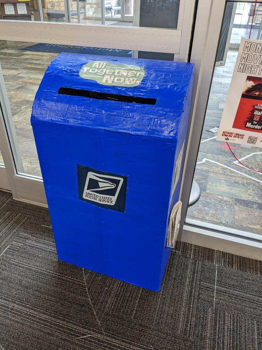 Cardboard big blue postal mailbox 