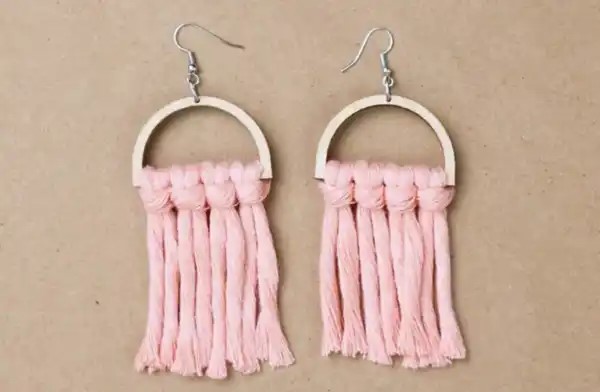 wooden half circles with earring hooks and pink macrame cord