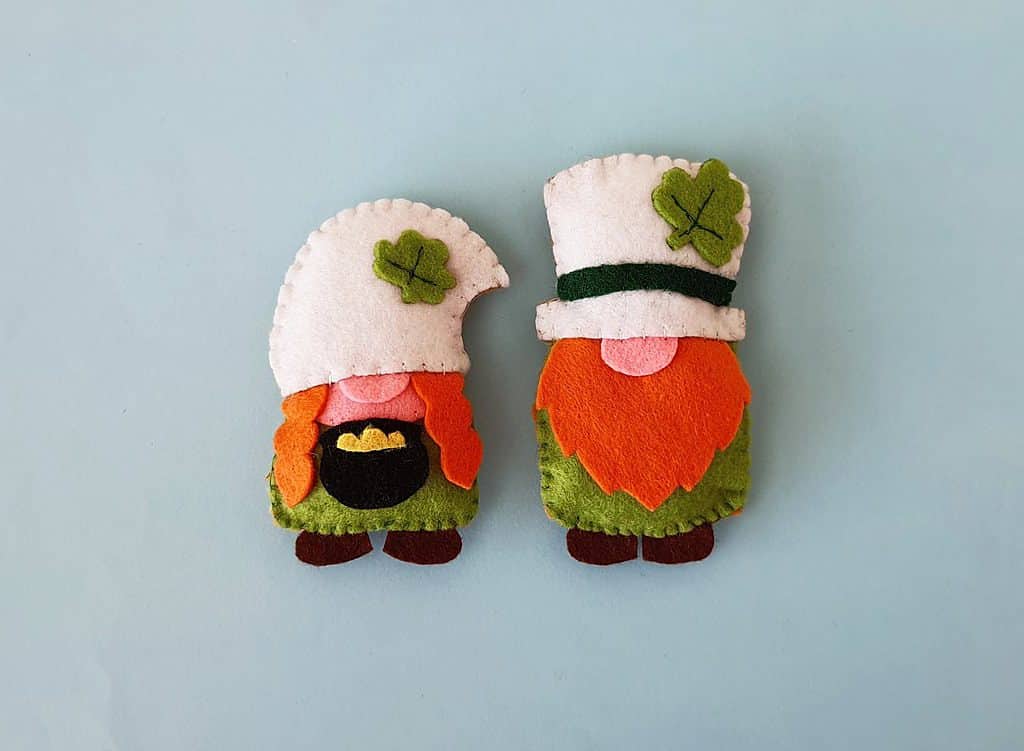 An image of two felt gnomes in St. Patrick's Day costumes