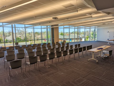 Meeting Room AB at Belle Isle with an audience style setup in half the room