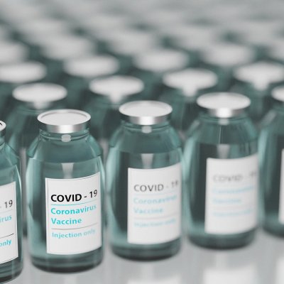 vials of covid 19 vaccine lined up