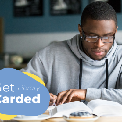 Get the Most Out of Your Library Card young man in library studying