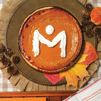 Metropolitan Library System logo in whipped cream on pumpkin pie.