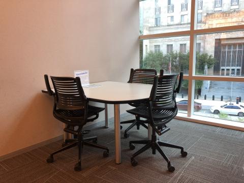 Study Room D at the Downtown Library equipped with small table and three chairs