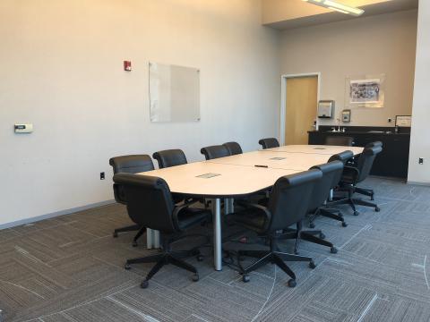 Jim Thorpe Conference Room at the Downtown Library with conference table and chairs