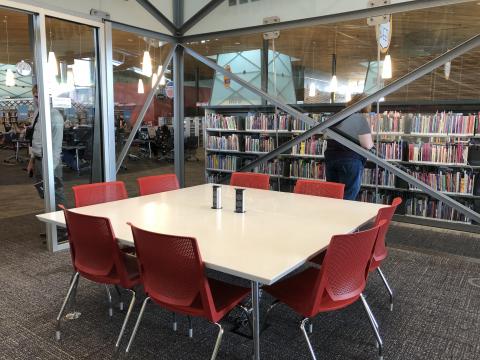 Discover Room at Northwest with square table and eight chairs