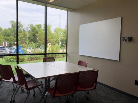 Study Room B at Southern Oaks Library with square table, chairs, and white board