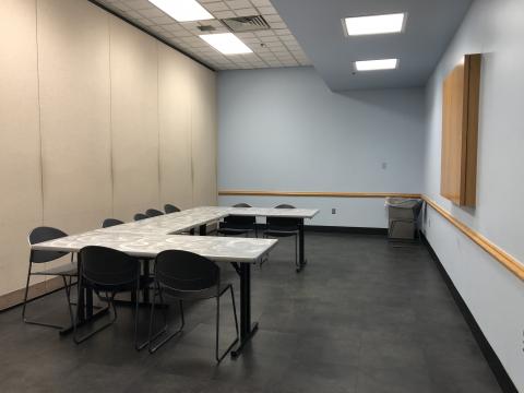 U-shaped setup with tables and chairs in Meeting Room B at Midwest City