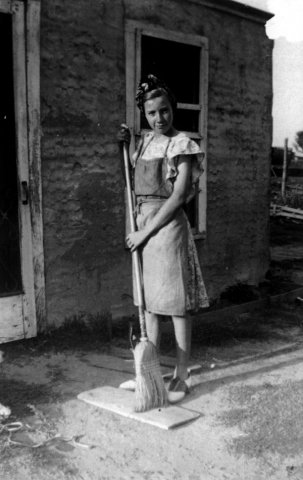 Young girl sweeping Young girl sweeping