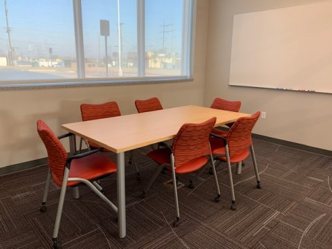 Study room at Del City with a table and 6 chairs