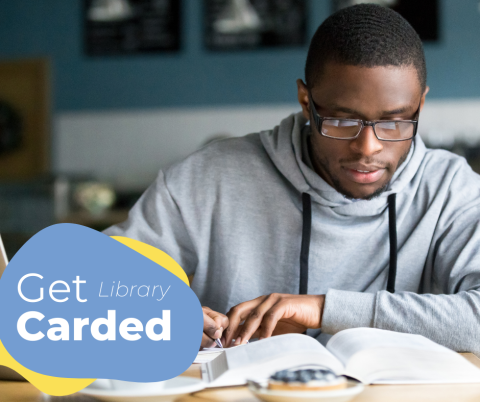 Get the Most Out of Your Library Card young man in library studying