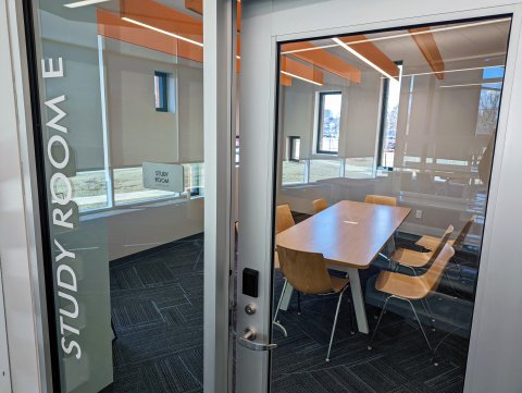 Study room with one table and eight chairs