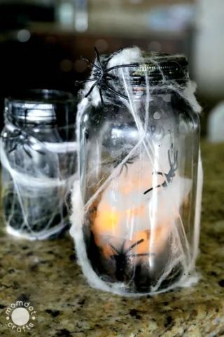 luminary with spider webs