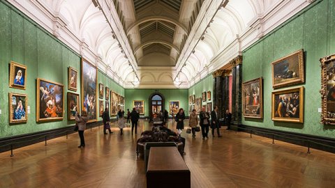 Art gallery hallway with paintings 