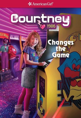 A white girl with blonde hair and 80s clothing smiles over an arcade cabinet.