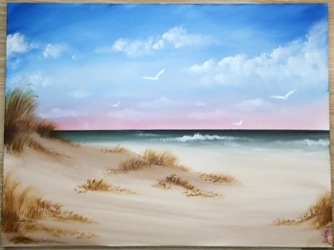 Beach landscape scene with blue skies, clouds, ocean waves, and sandy grass painted with acrylic paints.