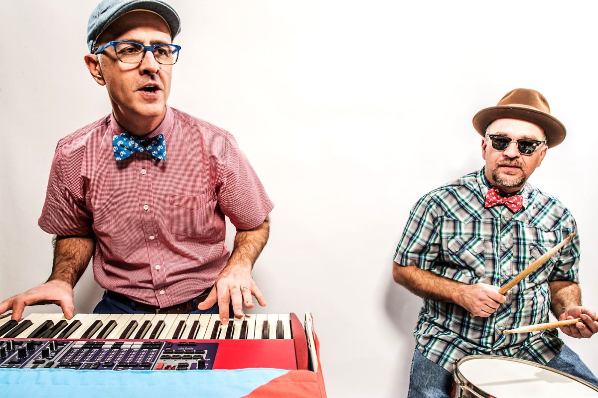 Members of Sugar Free Allstars playing keyboard and drums.