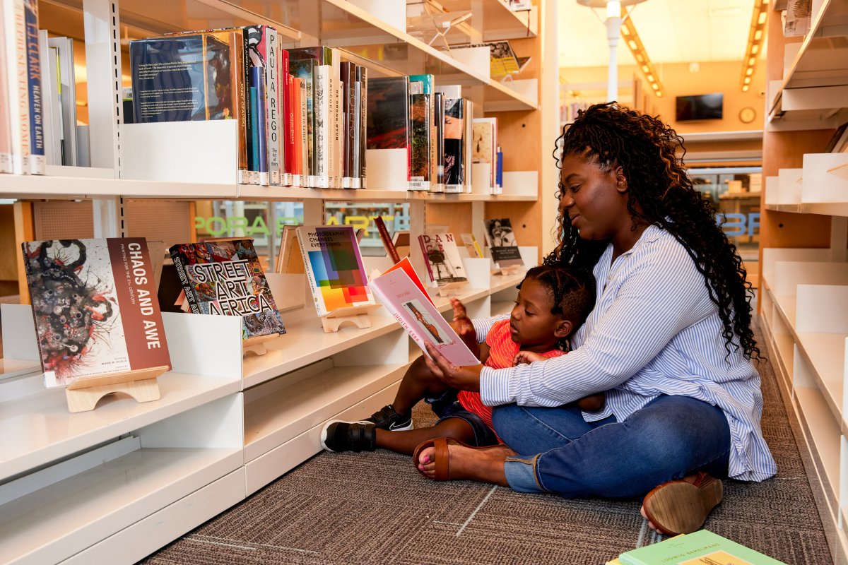 mother reads to a child