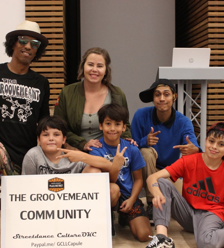 Members of Groovemeant Community posing as a group.