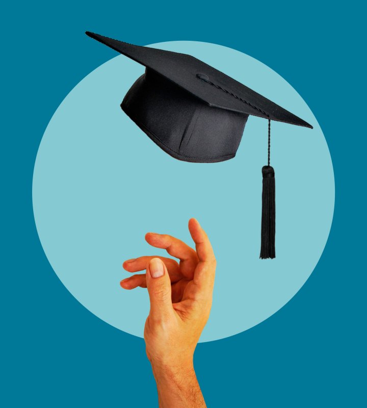 Hand with student's graduation cap thrown in the air on blue background.